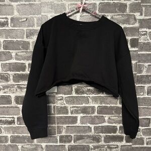 WeWoreWhat black cropped oversized sweater